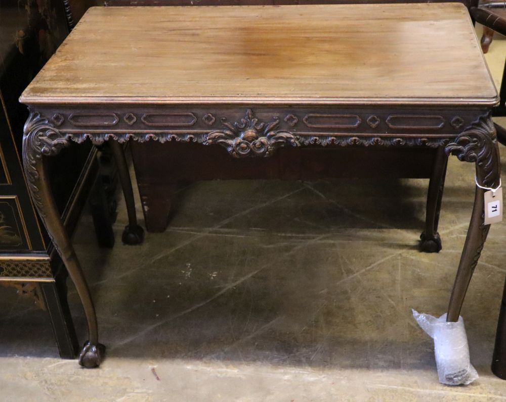A Chippendale Revival mahogany centre table, having moulded top with rounded corners on cabriole legs and claw and ball feet, width 90c